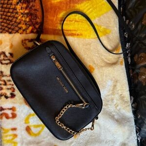 Black Michael Kors crossbody with detachable gold chain